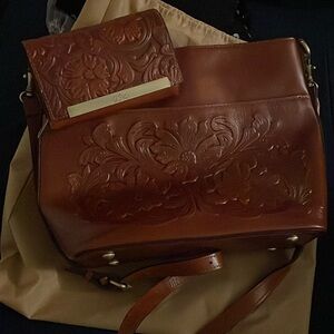 Patricia Nash leather purse. Immaculate without tags. Includes storage bag.